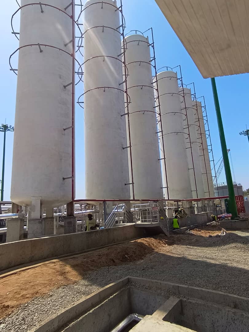 Vertical cryogenic LNG storage tanks at a gas infrastructure project